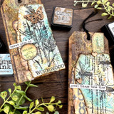 Rustic tag with the wormwood herb, stamped 'never give up' and 'great things take time - WORMWOOD.'