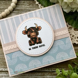 Darling Menagerie card, the sweet baby giraffe, bear and Highland calf grouped inside circle frames on a soft pastel background.