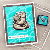 Handmade card with a torn deckle-edge, stitched die-cut frame layered over the design.