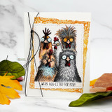 Handmade card with a torn deckle-edge, stitched die-cut frame layered over the design.