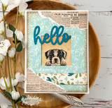 Card with a peeking boxer puppy on newsprint paper and a "hello" die-cut