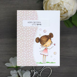 Garden girl in a pink dress on a soft dotted panel with 'Happy Birthday little one.'