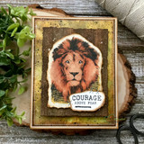 Rustic card with the lion colored on a wood slice, 'Courage above fear'