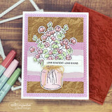 The wrinkle texture in kraft gold behind a jar of pink flowers on a layered card.