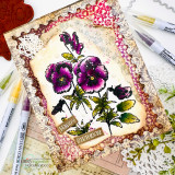Ornate layered card with hand colored purple pansies, lace edging and the tile pattern softly stamped behind, styled with markers.