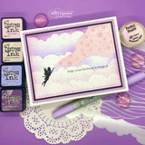 Soft cloud-sky card with a fairy silhouette and 'Hope your birthday is magical.'