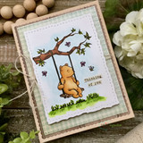 Card with Pooh on his branch swing over soft green, 'Thinking of you.'