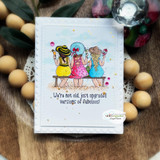 Soft white card of the friends in pink, blue and yellow with the upgraded-fabulous banner below.