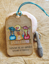 Kraft gift tag of the three friends stamped in sepia with the upgraded-fabulous line.