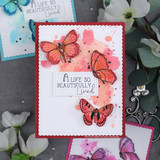 Card with warm red-orange butterflies on watercolor, 'A life so beautifully lived.'