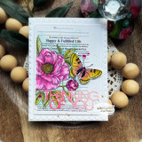 Card of a pink peony and butterfly over the ledger script, 'thinking of you.'