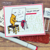 Bear at his math board on a grid-paper card, captioned "Enjoy your school year!", with the red rubber stamp shown alongside.