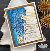 Blue woodgrain card with the snowman and a white snowflake die-cut behind him