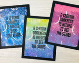 Three galaxy-colored starry moon background panels with 'A certain darkness is needed to see the stars' on the samples.