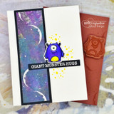 Purple galaxy starry background panel with a monster and 'GIANT MONSTER HUGS' on the sample.