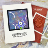Galaxy starry background behind a one-eyed monster with 'Happy Birthday (you little monster)' on the sample.