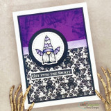 Handmade card with a purple gnome in a witch hat inside a circle, the sentiment 'Get into the spirit', over black floral damask papers.