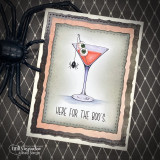 Card with an eyeball martini and spider over a diamond background and 'here for the boo's.'