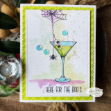 Card with a tall eyeball martini, cobweb and spider and 'here for the boo's.'