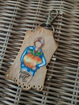 Angie Blom's Planner Gal cradles a pumpkin with 'happy fall,' a petite itty bitty red rubber stamp shown on an autumn card.