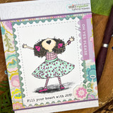 Card with the girl in a teal dress on patterned paper: 'Fill your heart with JOY!'