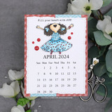 Mini April 2024 calendar card topped with the joyful girl and 'Fill your heart with JOY!'