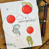 White card with stitched circles and dinosaurs on red balloons; the birthday wording is from another set.