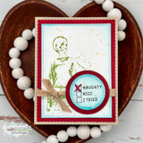 Green ink-blended card with a naughty-nice-I-tried circle badge over red twine