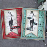 Two cards using the Scandinavian deer pattern behind giraffe silhouettes, 'Happy New Year' and 'Merry'.