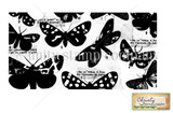 Stamp image: a 3x5 collage of solid and spotted moths and butterflies with numbered specimen labels and old German print