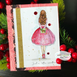 Card featuring the AngieGirl in a pink dress with red berries, layered on kraft wood-grain with holly.