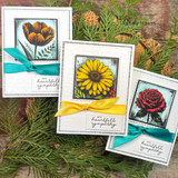 Two mini cards with an amber tulip and red rose and 'with heartfelt sympathy.'