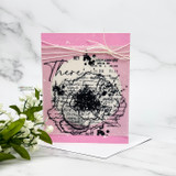 Pink card of the outlined poppy with "There."