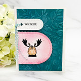 Handmade card or tag featuring a scalloped arch die-cut shape.