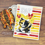 Card with a scalloped frame die around a kitten and 'here's a little reminder that the world is brighter with you in it'