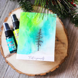 Card with a pine tree over a green watercolor wash, 'Trust in yourself.'