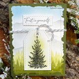 Card with a pine tree on a tag over a green frame, 'Trust in yourself.'