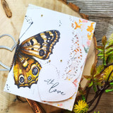Card with the amber butterfly and a heart: 'with love.'