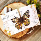 Card with the detailed butterfly colored amber-brown: 'with love.'