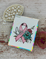 Handmade card featuring the floral awareness ribbon surrounded by blooms, in orange on a black-framed white base, stamped with 'Remember how loved you are'.