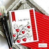 Handmade card featuring a whimsical swirled tree hung with hearts, with the sentiment "I really, really love you."