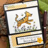 Card of Tigger bouncing over a yellow-striped panel, 'here for you as you bounce back.'