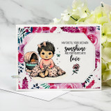 Floral card with the baby girl and 'May she fill your lives with sunshine and your hearts with love.'