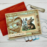 Card with the bunny and wildflowers over a wood-heart panel: 'You make the world a little brighter.'