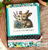 Card with the bunny and wildflowers on a bright floral panel: 'You make the world a little brighter.'