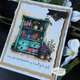 Gold-framed card of a rainbow book hutch, 'You are the reason my heart feels full'