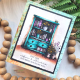 Turquoise hutch card on collage paper with wooden bead garland and the wildflowers sentiment