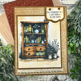 Book-page matted card of the sepia hutch with lace edge and cozy nook tag