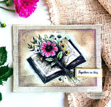 The flowers-from-a-book image on a layered burlap-and-vintage card — 'Together in this.'