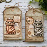 Two kraft gift tags each stamped with the cat, one reading 'Sup?' and one with a small sentiment strip.